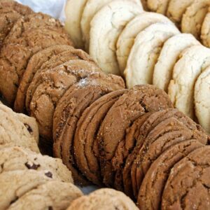 A close up of several different cookies on display.