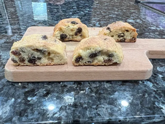 A picture of Choco chip cookies on the wooden tray